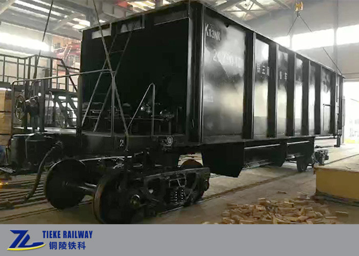 Carro ferroviario de la tolva del coche de tren del cargo de UIC 60t para las partículas minerales del mineral del lastre