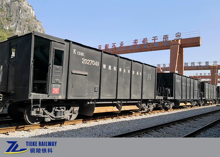 Carro ferroviario de la tolva del coche de tren del cargo de UIC 60t para las partículas minerales del mineral del lastre